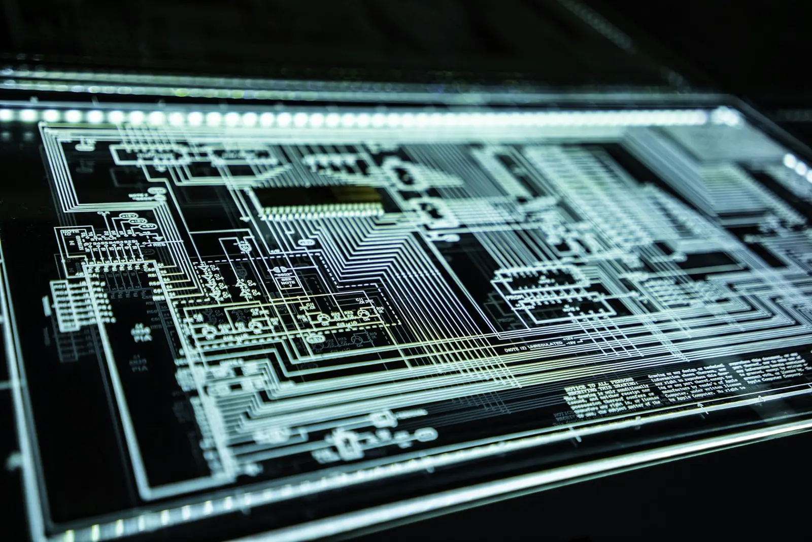 Illuminated circuit board representing intelligent systems