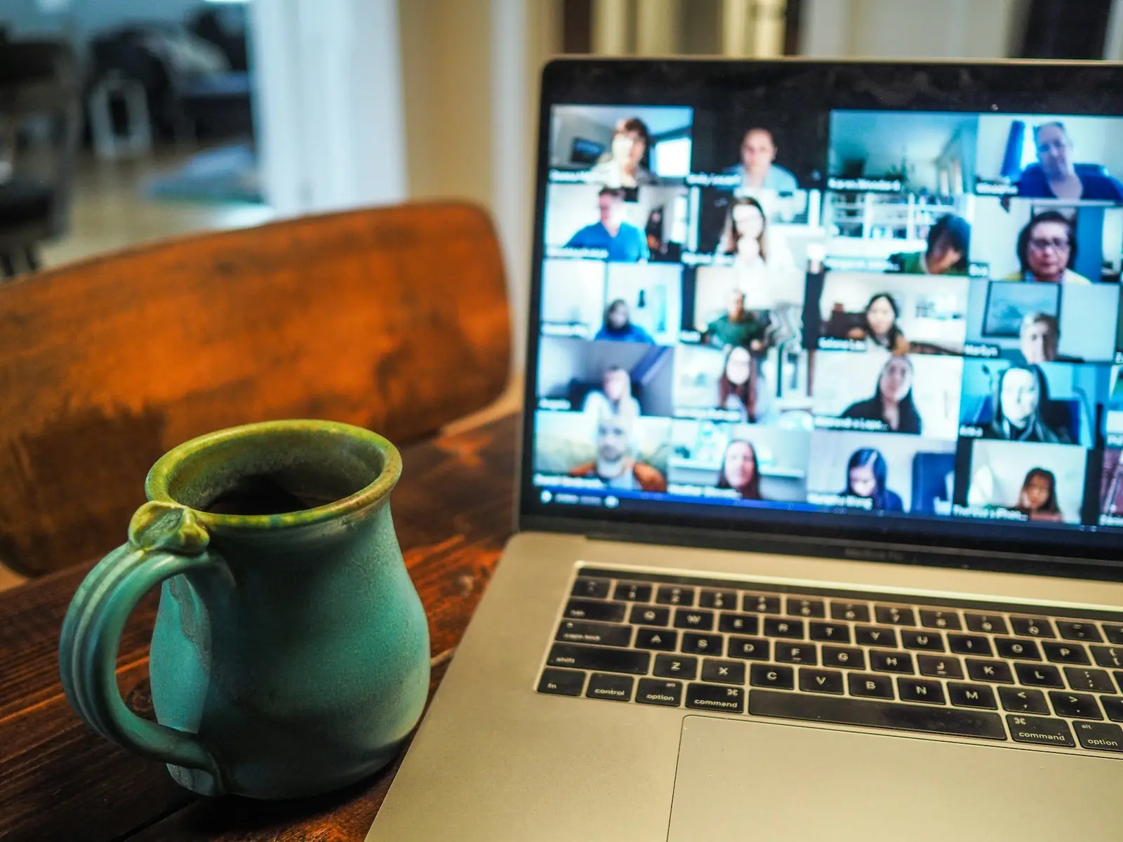 Video conference grid open on a laptop screen