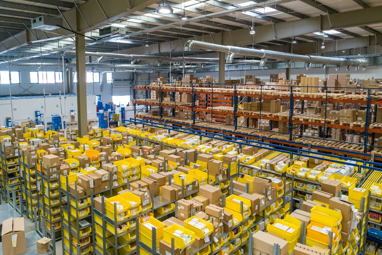 Organised distribution warehouse with stacked inventory